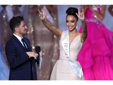 Miss France Ophely Mezino reacts to making the semi-finals during the the Miss World Final 2019 at the Excel arena in east London on Dec. 14, 2019.