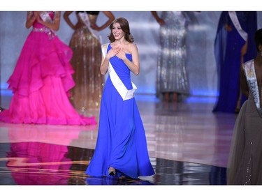 Miss Russia Alina Sanko reacts to making the semi-finals during the the Miss World Final 2019 at the Excel arena in east London on Dec. 14, 2019.