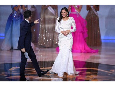 Miss Cook Islands Tajiya Eikura Sahay reacts to making the semi-finals during the the Miss World Final 2019 at the Excel arena in east London on Dec. 14, 2019.