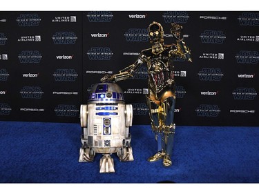 R2-D2 (L) and C-3PO arrive for the world premiere of Disney's "Star Wars: The Rise of Skywalker" on Dec. 16, 2019 in Hollywood, Calif.
