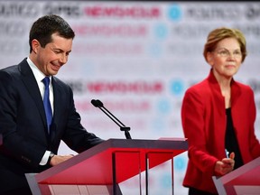 Democratic presidential hopeful Mayor of South Bend, Indiana Pete Buttigieg  and Massachusetts Senator Elizabeth Warren participate of the sixth Democratic primary debate of the 2020 presidential campaign season co-hosted by PBS NewsHour & Politico at Loyola Marymount University in Los Angeles, California on December 19, 2019.