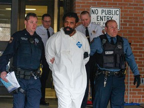 Suspect in Hanukkah celebration stabbings Thomas Grafton, 37 years old from Greenwood Lake,  leaves the Ramapo Town Hall in Airmont, New York after being arrested on December 29, 2019. - An intruder stabbed and wounded five people at a rabbi's house in New York during a gathering to celebrate the Jewish festival of Hanukkah late on December 28, 2019, officials and media reports said. Local police departments, speaking to AFP, declined to give the number of people injured. (Photo by Kena Betancur / AFP)