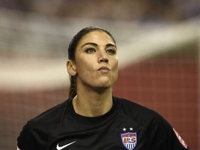 This file photo taken on June 30, 2015 shows USA goalkeeper Hope Solo reacting during their 2015 FIFA Women's World Cup semi-final football match between USA and Germany at the Olympic Stadium in Montreal.