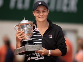 Ashleigh Barty poses with the trophy after her match against Marketa Vondrousova at the French Open at Stade Roland Garros.  (Susan Mullane-USA TODAY Sports/File Photo)