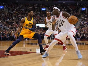 Toronto Raptors forward Pascal Siakam looks to make a play against Utah Jazz forward Jeff Green during the first half at Scotiabank Arena.