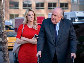 Charlize Theron as Megyn Kelly and John Lithgow as Roger Ailes in "Bombshell."