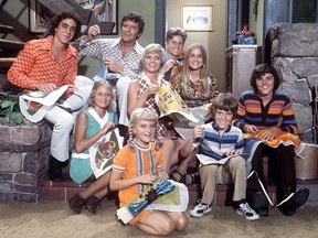 The Brady Bunch cast, from left, back row: Barry Williams, Robert Reed, Ann B. Davis; middle row: Eve Plumb, Florence Henderson, Maureen McCormack; front row:Susan Olsen, Mike Lookinland and Christopher Knight.