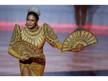 Michelle Daniela Dee of Philippines performs on stage during the opening ceremony of the Miss World final in London, Britain on Dec. 14, 2019.