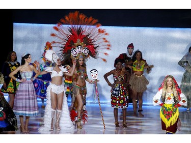 Participants perform on stage during the Miss World final in London, Britain on Dec. 14, 2019.