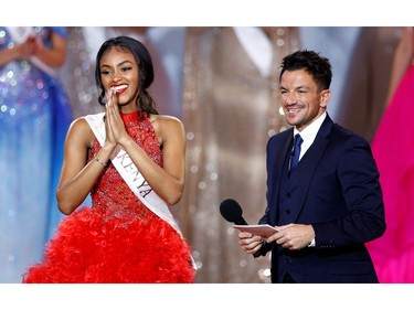 Maria Nyamai of Kenya reacts on stage during the Miss World final in London, Britain Dec. 14, 2019.