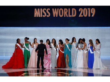 Miss World Top 12 pose on stage during the Miss World final 

in London, Britain, Dec. 14, 2019.