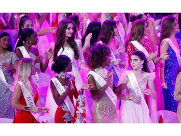 Contestants react on stage during the Miss World final  London, Britain Dec. 14, 2019.