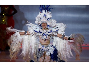 Jessica Jimenez of Costa Rica performs on stage during the opening ceremony of the Miss World final in London, Britain on Dec. 14, 2019.