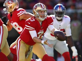 C.J. Beathard of the San Francisco 49ers tosses the ball during their game against the New York Giants at Levi's Stadium on November 12, 2017 in Santa Clara, California. (Ezra Shaw/Getty Images)