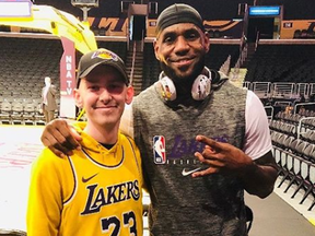 Corey Groves, left, with hero LeBron James on Christmas Day in Los Angeles.