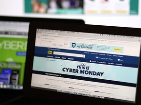 In this photo illustration, an ad seen on the Best Buy website for a Cyber Monday sale is displayed on laptop computers on November 27, 2017 in San Anselmo, California. (Photo Illustration by Justin Sullivan/Getty Images)