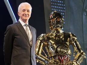 Anthony Daniels poses with C-3PO and BB-8 at a fan event for Star Wars: The Rise of Skywalker in Tokyo on Dec. 11, 2019.
