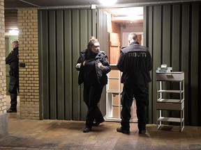 Police officers stand at a house in Valby, Denmark on December 11, 2019 during a police action based on suspicions of preparations of terror attacks with militant Islamist motive. (NILS MEILVANG/Ritzau Scanpix/AFP via Getty Images)