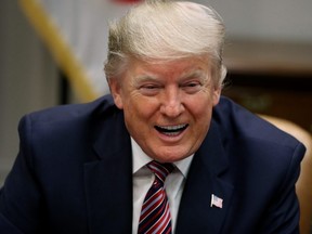 U.S. President Donald Trump hosts a roundtable discussion with small business owners and members of his administration in the Roosevelt Room at the White House in Washington, D.C., on Friday, Dec. 6, 2019.