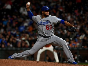 Yimi Garcia of the Los Angeles Dodgers pitches against the San Francisco Giants during their game at Oracle Park on Sept. 27, 2019, in San Francisco, Calif.