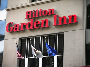 A sign marks the location of a Hilton Garden Inn on September 12, 2013 in Chicago, Illinois.