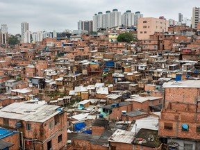 "Paraisopolis is one of the biggest favelas of Sao Paulo. More than 50.000 people are living there. Curiously the favela is located in a rich neighborhood of the city.