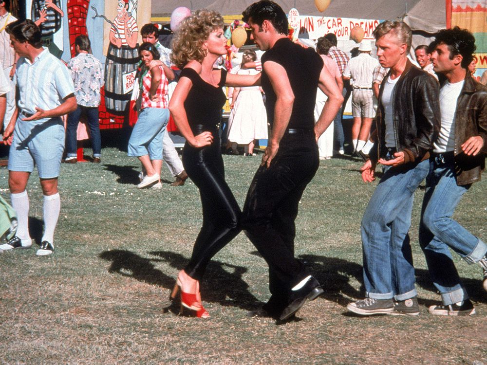 Olivia NewtonJohn, John Travolta reunite in 'Grease' costumes
