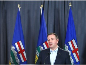 Alberta Premier Jason Kenney speaks to media at the United Conservative Party annual general meeting in northeast Calgary on Sunday.