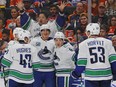 The Vancouver Canucks celebrate a goal by forward Loui Eriksson against the Edmonton Oilers at Rogers Place on Nov. 30.