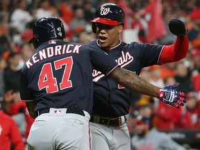 Washington Nationals designated hitter Howie Kendrick (47) celebrates with left fielder Juan Soto (22) after hitting a home run against the Houston Astros during Game 7 of the 2019 World Series at Minute Maid Park. (Troy Taormina-USA TODAY Sports)