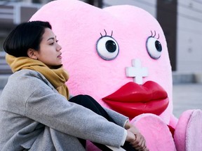 Actor Fumi Nikaido and the character 'Little Miss Period' are seen in this undated image from the movie Little Miss Period, released by Yoshimoto Kogyo Co., and obtained by Reuters on December 12, 2019.