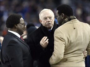 Dallas Cowboys owner Jerry Jones speaks with former Dallas Cowboys player Michael Irvin before the game against the Chicago Bears at Soldier Field, Chicago, Dec 5, 2019. (Quinn Harris-USA TODAY Sports)