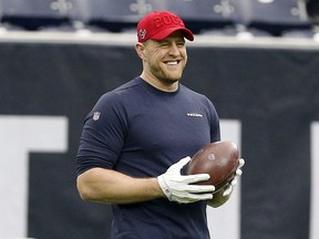 Texans' J.J. Watt stands on the sideline before a game against the Broncos at NRG Stadium in Houston, Dec. 8, 2019.