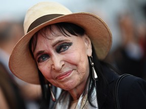Danish-French actress Anna Karina poses as she arrives on May 8, 2018, for the screening of the film "Todos Lo Saben (Everybody Knows)" and the opening ceremony of the 71st edition of the Cannes Film Festival in Cannes, southern France.