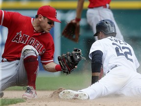 Victor Reyes of the Detroit Tigers beats the tag from second baseman Ian Kinsler of the Los Angeles Angels to steal second base at Comerica Park on May 31, 2018 in Detroit. (Duane Burleson/Getty Images)