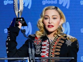 Madonna holds up her Advocate for Change award during the 30th annual GLAAD Awards ceremony in New York City, May 4, 2019.