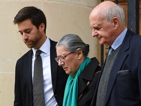 Andrew Vella, Rose-Marie Vella and Michael Vella, the son, mother and father of murdered journalist Daphne Caruana Galicia, leave the Courts of Justice on December 4, 2019 in Valletta, Malta. (ANDREAS SOLARO/AFP via Getty Images)