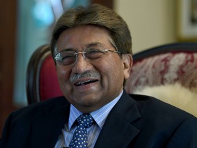 In this photograph taken Nov. 14, 2014, Pakistan's former military ruler General Pervez Musharraf smiles during an interview with AFP in Karachi.