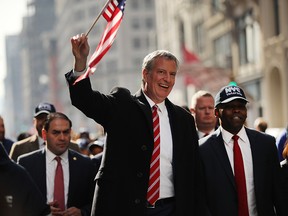 New York Mayor Bill de Blasio marches in the Veterans Day Parade on November 11, 2019 in New York City. (Spencer Platt/Getty Images)