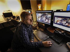 In this file photo from 2014, animator Daryl Sawchuck works in the MPC post-production studio in Vancouver. There are reports this week the company is closing its Vancouver location.