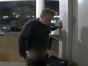 A doorbell camera captured video of a drunk dude pooping on a Denver man's front porch. (Screen grab)