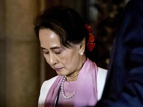 Nobel peace laureate Aung San Suu Kyi, leaves the Peace Palace in The Hague, Netherlands, on Dec. 12, 2019.