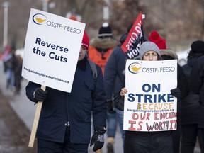 Educators picket outside the Bickford Centre in Toronto on Wednesday Dec. 11, 2019.