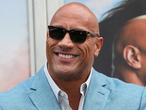 Dwayne Johnson attends a Hand and Footprint ceremony honoring Kevin Hart at the TCL Chinese Theatre IMAX on Dec 10, 2019 in Hollywood, Calif..