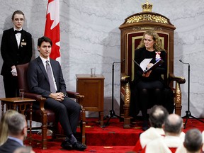 Gov. Gen. Julie Payette looks at Prime Minister Justin Trudeau during the delivery of the Throne Speech in the Senate, as parliament prepares to resume for the first time after the election in Ottawa,  Dec. 5, 2019.