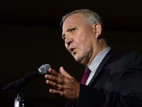 Liberal candidate Bill Blair speaks to reporters in Toronto on Friday, Sept. 20, 2019.