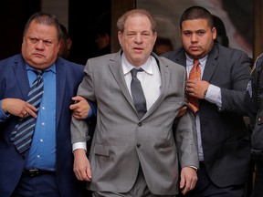 Harvey Weinstein exits following a hearing in his sexual assault case at New York State Supreme Court in New York, Dec. 6, 2019.