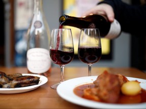 Soon you'll be able to order wine and other alcohol with your take out orders. REUTERS/Benoit Tessier