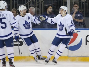 Toronto Maple Leafs defenceman Morgan Rielly (centre) has led the team in ice time this season. (USA TODAY SPORTS)