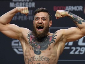 Conor McGregor poses during a ceremonial weigh-in for UFC 229 at T-Mobile Arena on October 5, 2018 in Las Vegas, Nevada.
